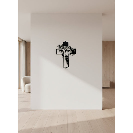 Decorative wall cross with Christ's face design.